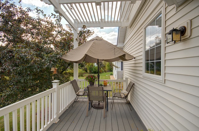 wooden terrace with a pergola