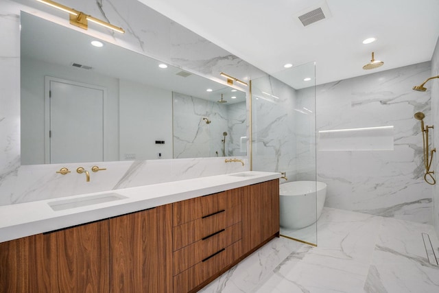 full bathroom with marble finish floor, stone wall, a sink, and a marble finish shower