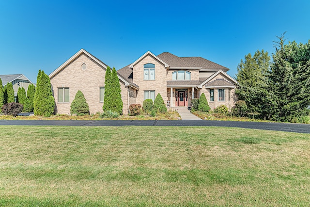 view of front of home with a front yard