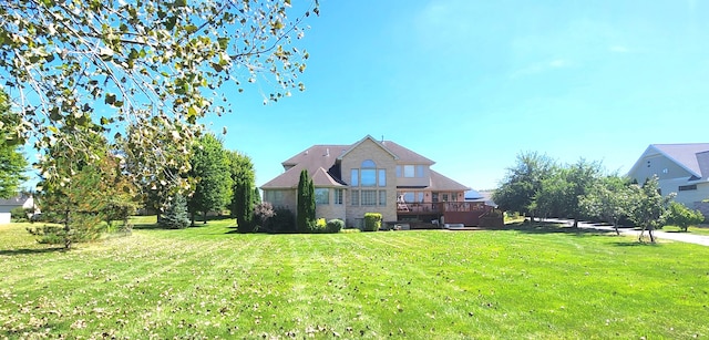 view of front of home with a front lawn