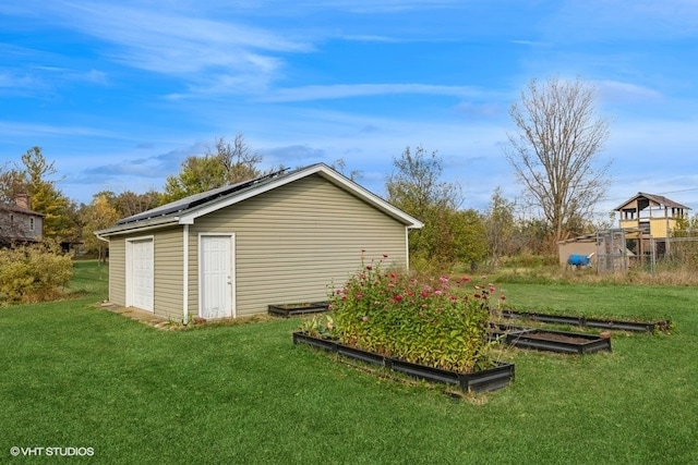 view of outbuilding with a lawn