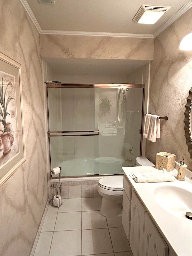 full bathroom with tile patterned floors, vanity, toilet, and combined bath / shower with glass door