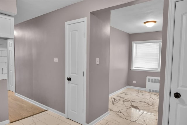 hallway with radiator heating unit