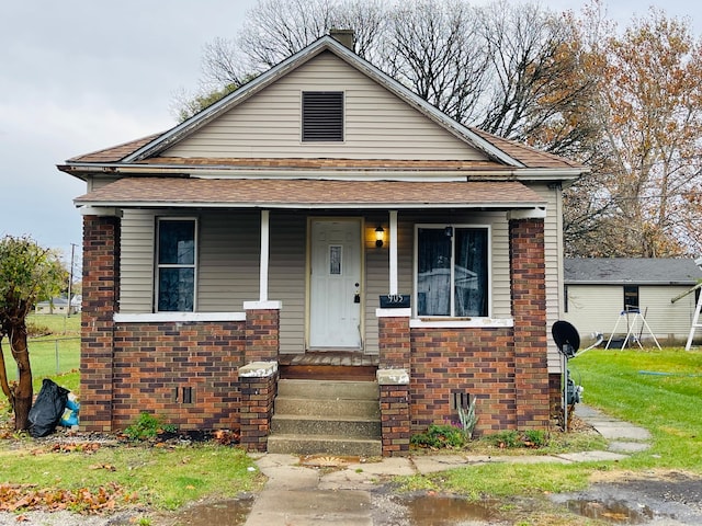 bungalow-style house featuring covered porch