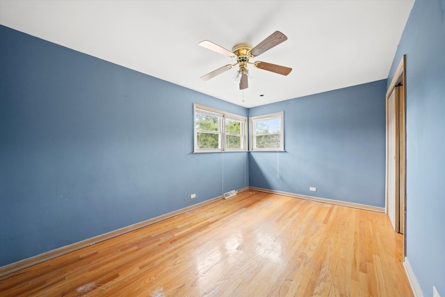 unfurnished bedroom featuring light hardwood / wood-style flooring and ceiling fan