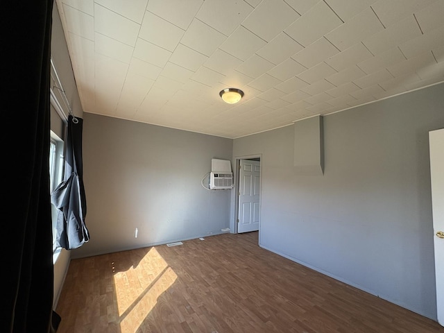 empty room featuring wood finished floors