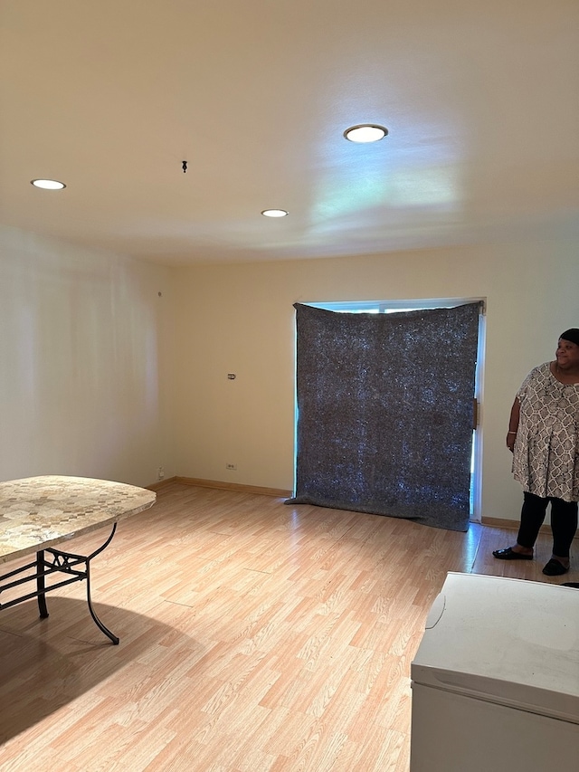 sitting room with light hardwood / wood-style floors