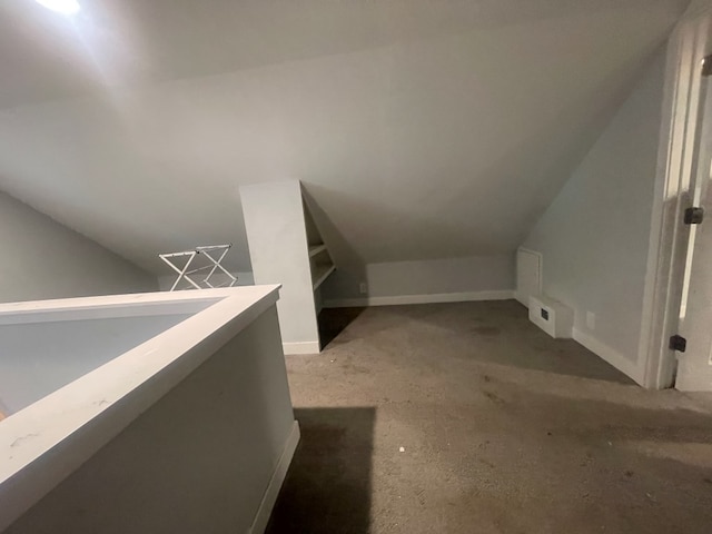 bonus room featuring vaulted ceiling