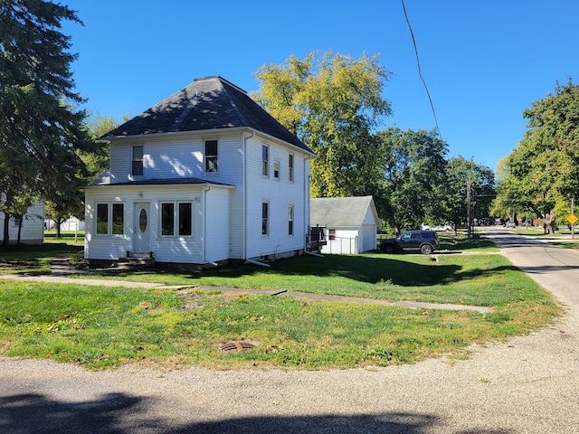 view of property exterior with a lawn