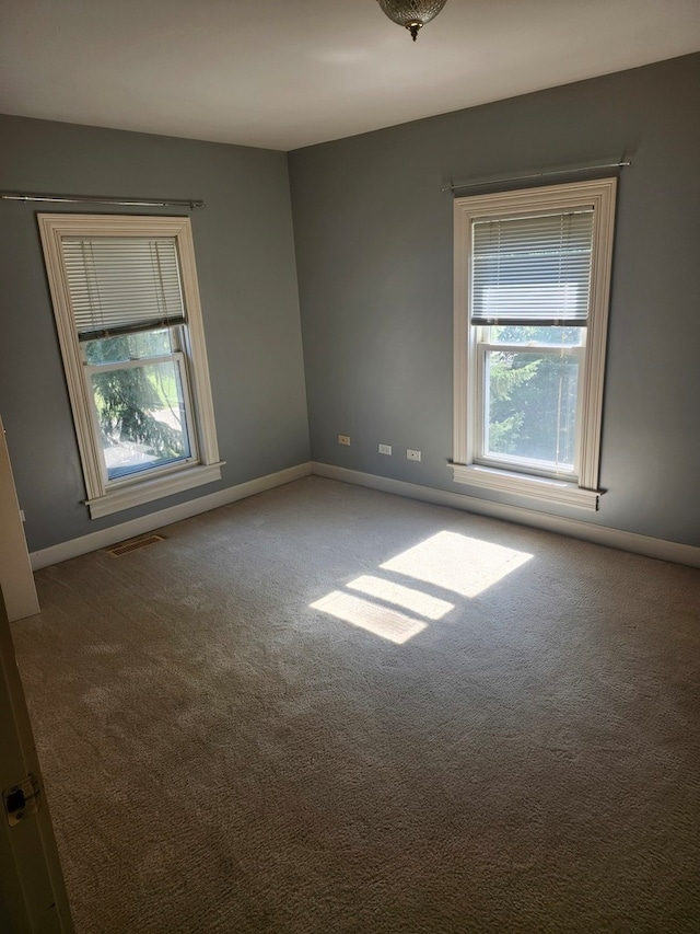 view of carpeted spare room