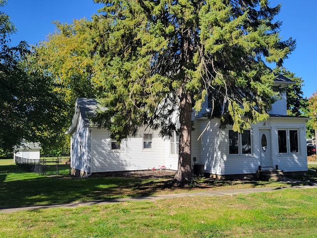 exterior space with a front lawn