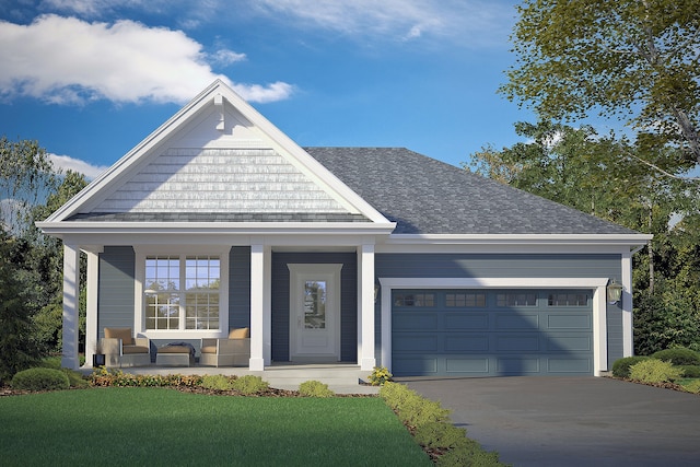 view of front of house with a garage, a front lawn, and covered porch