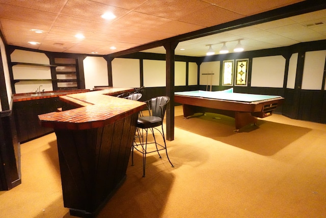 playroom with light carpet, wet bar, pool table, and a drop ceiling