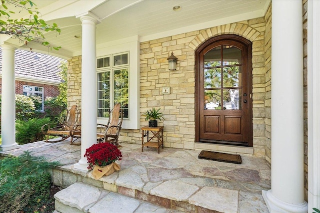 entrance to property with a porch