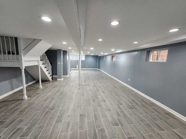 basement with wood-type flooring