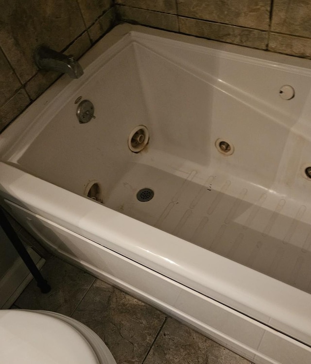11 Saint Thomas Colony Unit 4, Fox Lake, IL 60020 - full bathroom featuring tile patterned floors and a tub with jets