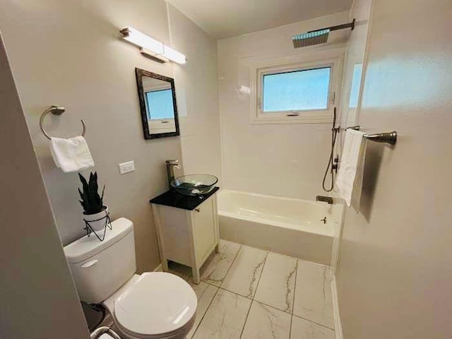 full bathroom with vanity, shower / tub combination, and toilet