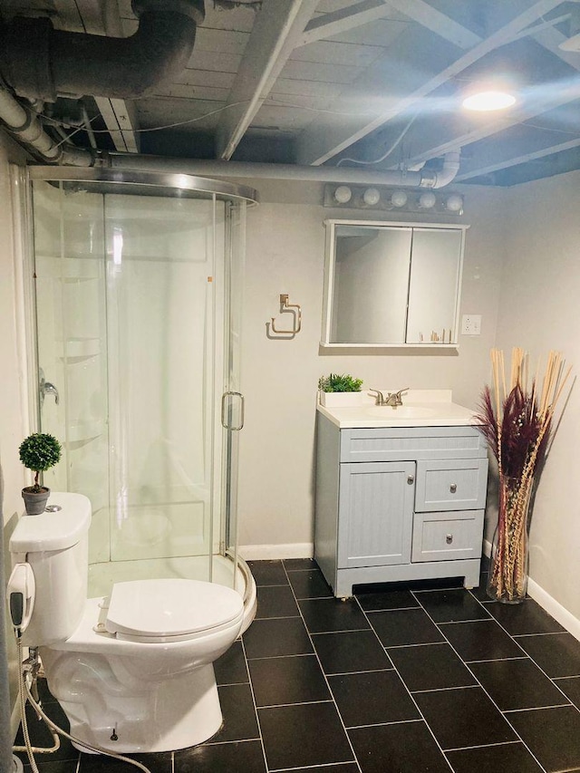 bathroom featuring walk in shower, toilet, vanity, beam ceiling, and tile patterned flooring