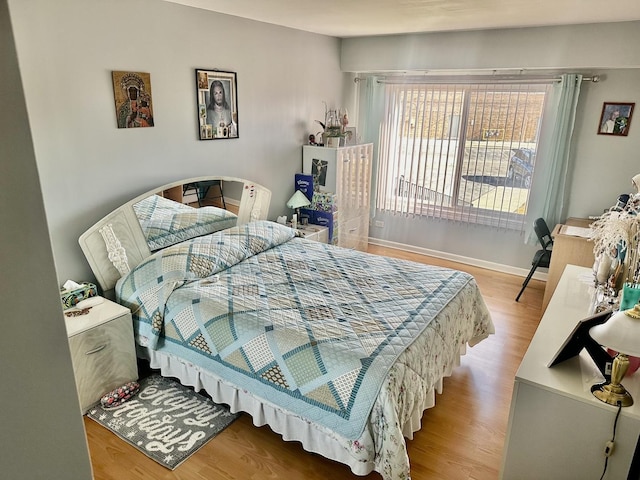 bedroom featuring light hardwood / wood-style flooring