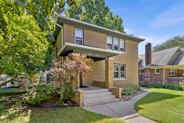 view of front of house with a front lawn