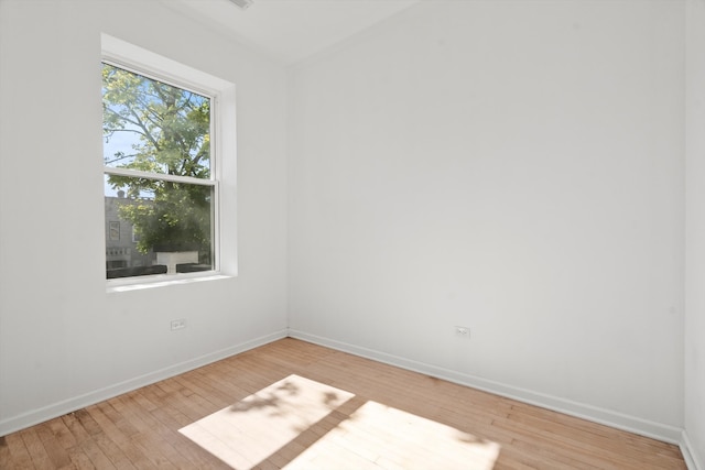 unfurnished room featuring light wood-type flooring