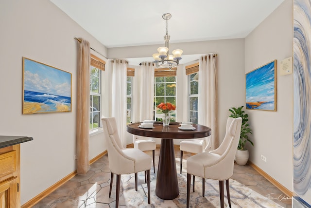 dining room featuring a chandelier