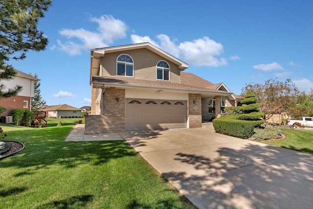 view of front property with a garage and a front lawn