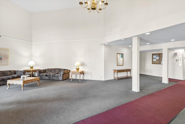 carpeted living area featuring recessed lighting, a high ceiling, and a chandelier