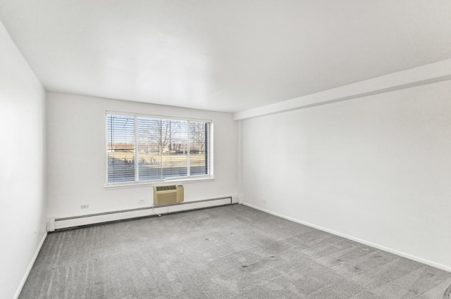 empty room featuring baseboards, carpet floors, baseboard heating, and a wall mounted AC