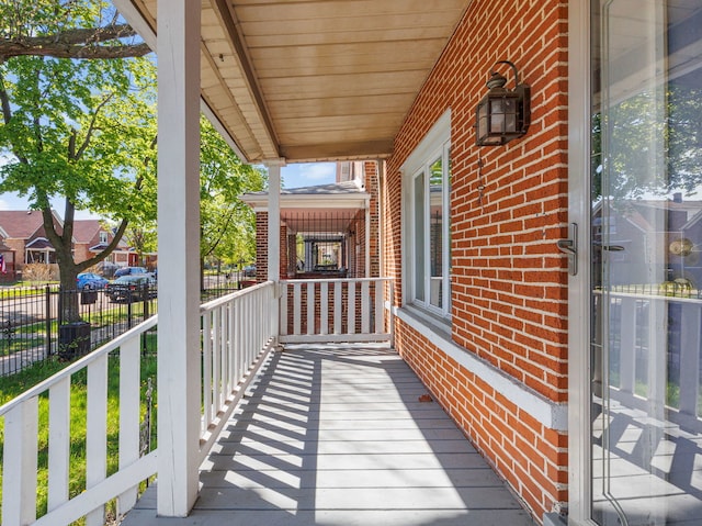 balcony featuring covered porch