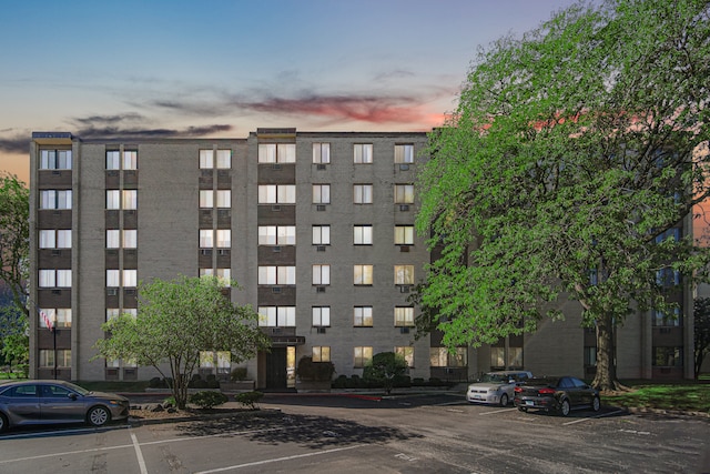 view of outdoor building at dusk