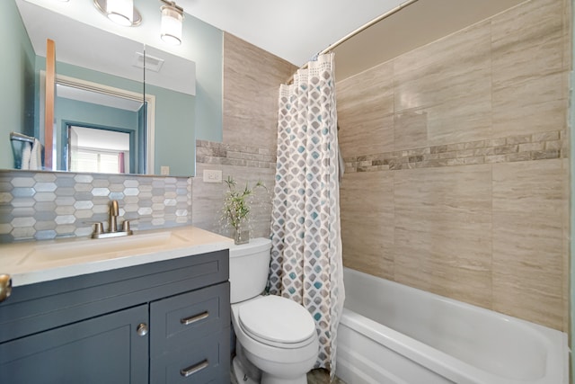 full bathroom with tile walls, shower / bath combo, backsplash, vanity, and toilet