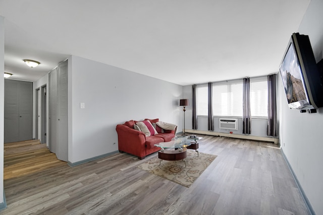 living room featuring light wood-type flooring and cooling unit