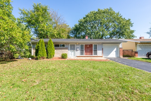 single story home with a garage and a front yard