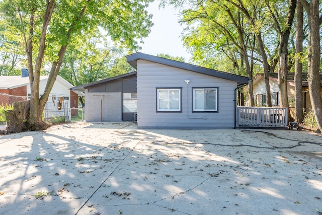 back of house with a patio area