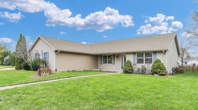 ranch-style home with a front yard