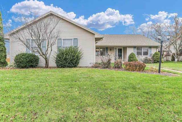 single story home with a front yard