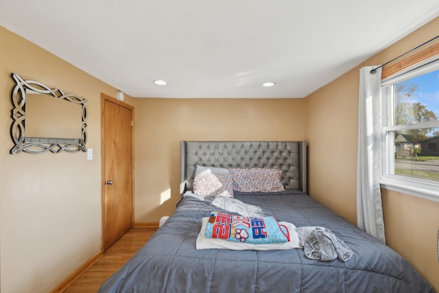 bedroom featuring hardwood / wood-style flooring