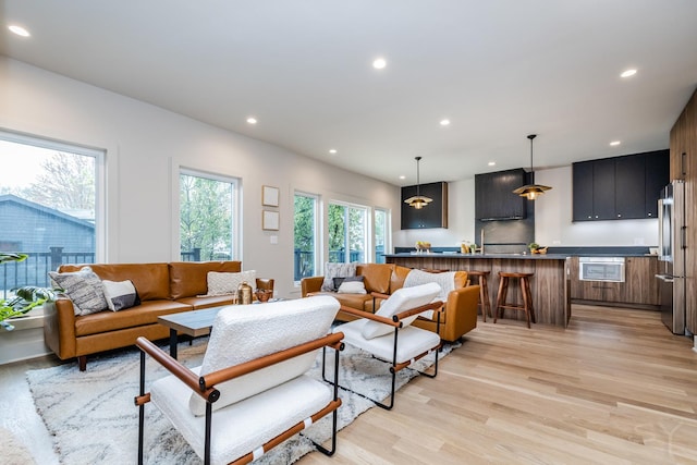 2715 Reese Ave, Evanston, IL 60201 - living room with light wood-style flooring and recessed lighting
