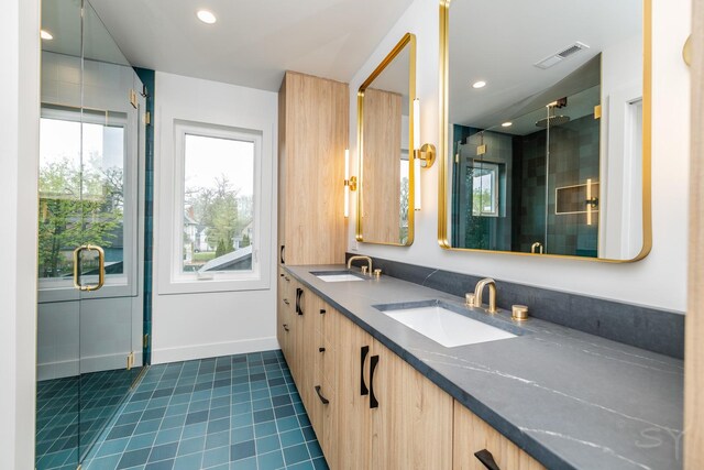 2715 Reese Ave, Evanston, IL 60201 - full bath featuring a stall shower, recessed lighting, tile patterned flooring, baseboards, and double vanity
