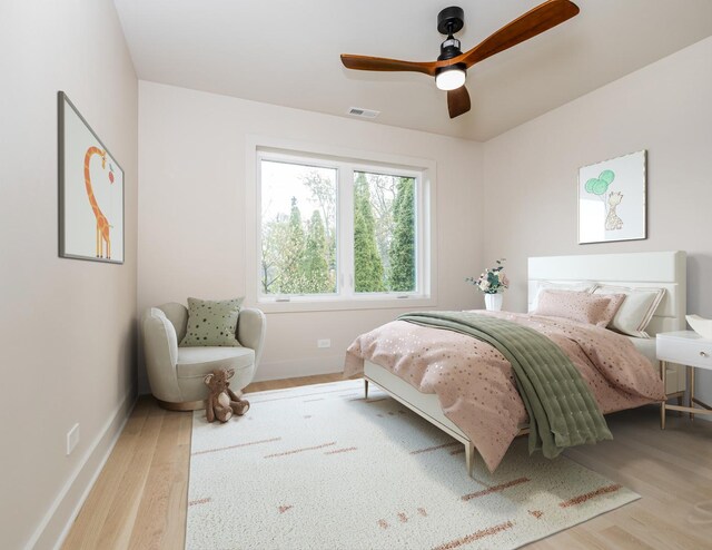 2715 Reese Ave, Evanston, IL 60201 - bedroom featuring wood finished floors, baseboards, and a ceiling fan