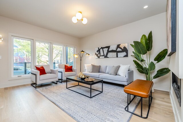 2715 Reese Ave, Evanston, IL 60201 - living area featuring light wood-style flooring, baseboards, a chandelier, and recessed lighting