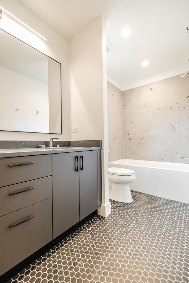 2715 Reese Ave, Evanston, IL 60201 - bathroom with toilet, vanity, a tub to relax in, recessed lighting, and a shower