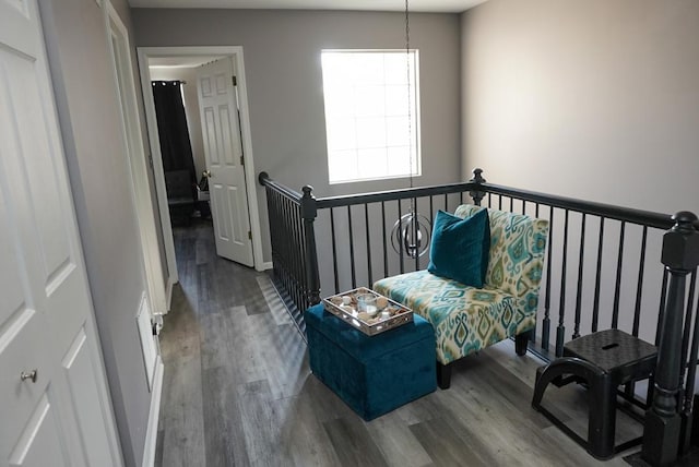 sitting room with hardwood / wood-style floors