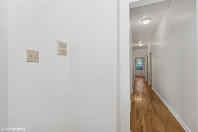 corridor featuring hardwood / wood-style flooring