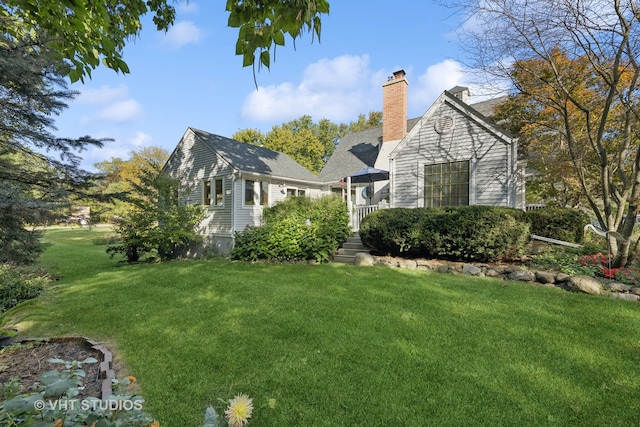 exterior space with a front yard