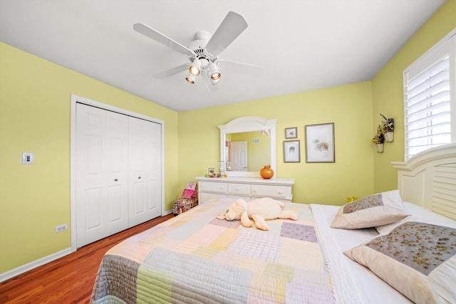 bedroom featuring a closet, ceiling fan, and hardwood / wood-style floors