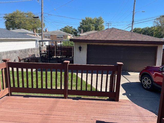 679 Manistee Ave, Calumet City, IL 60409 - wooden deck featuring an outdoor structure and a detached garage
