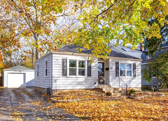 view of front of house featuring an outbuilding and a garage