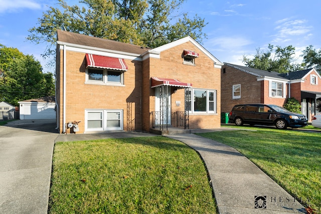 view of front facade with a garage and a front lawn